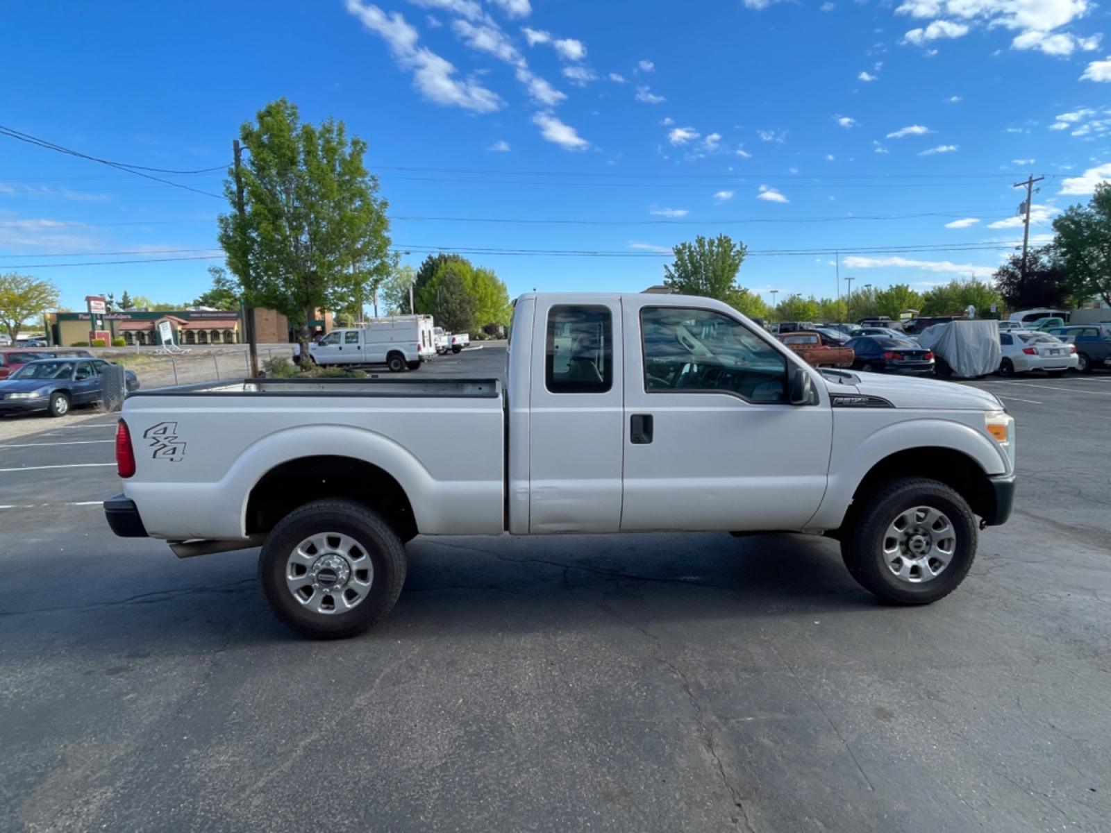 2011 Alpine White /Grey Ford F-350 SD XL (1FT8X3B62BE) with an 6.2 Liter V8 engine, AT transmission, located at 813 E Fairview Ave, Meridian , ID, 83642, (208) 336-8230, 43.618851, -116.384010 - Photo #4